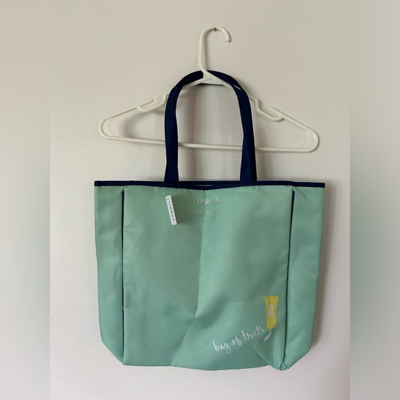 NWT Kate Spade Clinique Shopping Shoulder Travel Tote Bag Purse Bag of Tricks Ad - Picture 1 of 10